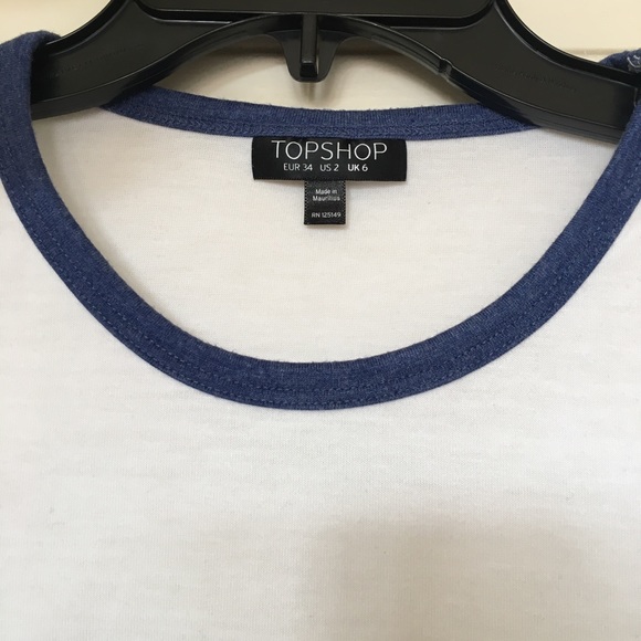 A blue and white shirt - Picture 3 of 3